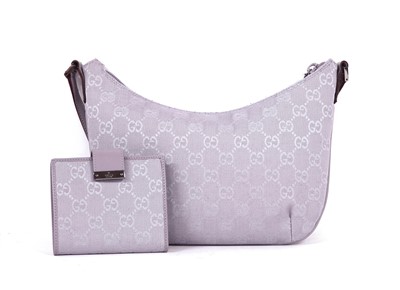 Lot 796 - A Gucci lilac monogram canvas shoulder bag