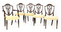 Lot 522 - Five George III mahogany shield back dining chairs