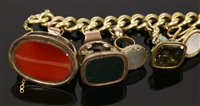 Lot 13 - An 18ct gold curb link bracelet with later 9ct gold padlock and eleven assorted seals
