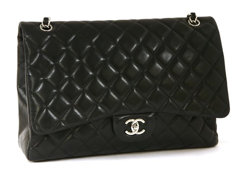 Lot 742 - A Chanel classic single flap black leather maxi handbag
