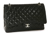 Lot 742 - A Chanel classic single flap black leather maxi handbag