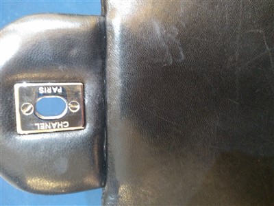 Lot 742 - A Chanel classic single flap black leather maxi handbag