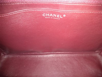Lot 742 - A Chanel classic single flap black leather maxi handbag