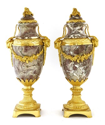 Lot 554 - A pair of rouge marble and ormolu-mounted urns