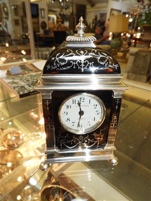 Lot 115 - A silver and tortoiseshell eight-day timepiece