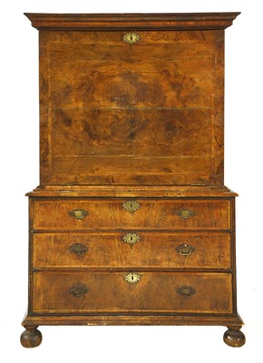 Lot 832 - A walnut escritoire