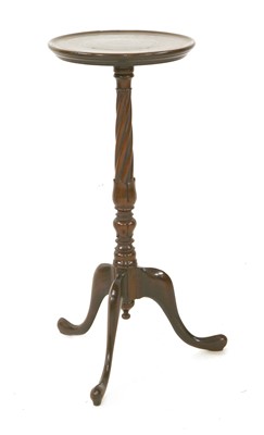 Lot 777 - A mahogany wine table