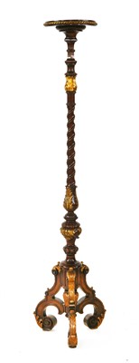 Lot 559 - A carved walnut and parcel gilt torchère