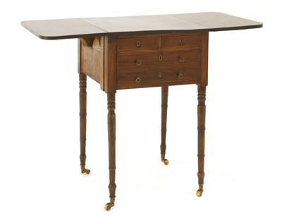 Lot 269 - A Victorian strung mahogany drop-leaf table