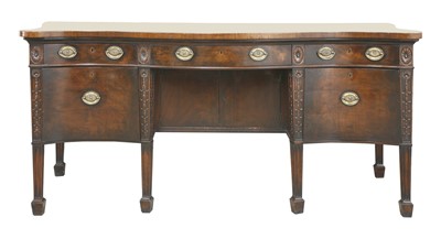 Lot 43 - A George III-style serpentine mahogany sideboard