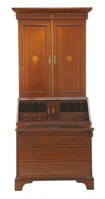 Lot 271 - An Edwardian strung and inlaid mahogany bureau bookcase
