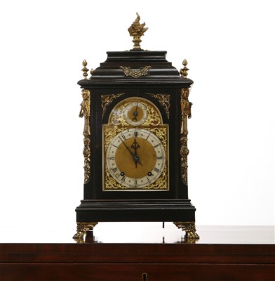 Lot 101 - An Edwardian ebonised mantel clock