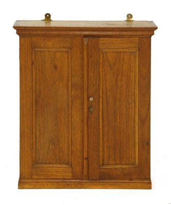 Lot 849 - A wall hanging cedar cigar cabinet