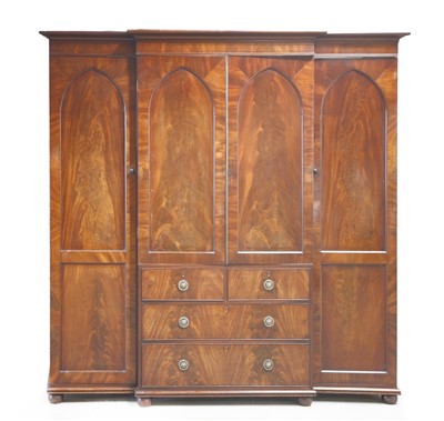 Lot 248 - A Victorian flame mahogany breakfront wardrobe