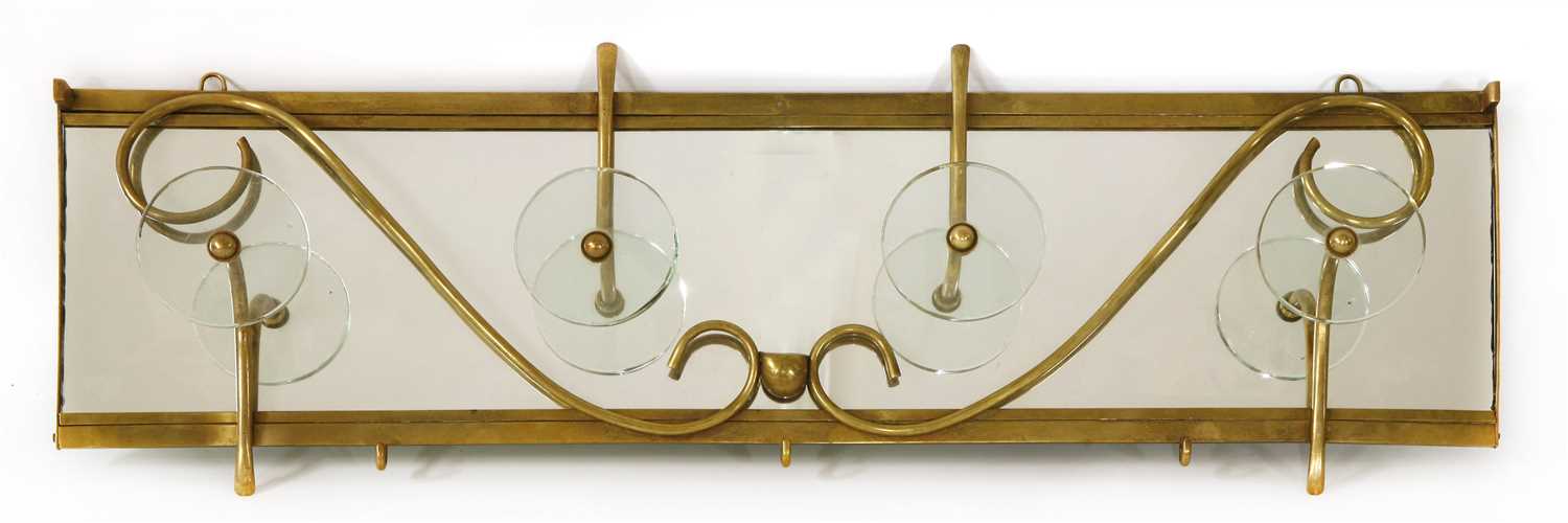 Lot 123 - A mirrored brass coat rack