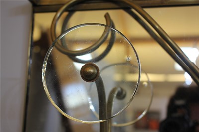Lot 123 - A mirrored brass coat rack