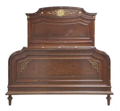 Lot 273 - A French plum pudding mahogany double bed