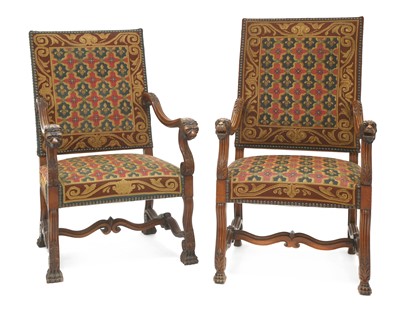 Lot 4 - A pair of French walnut elbow chairs