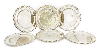 Lot 132 - Six George III silver dessert plates