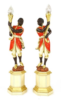 Lot 854 - A pair of blackamoor floor lamps