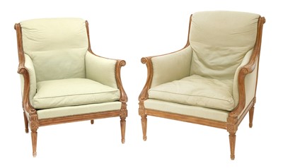 Lot 110 - A pair of French upholstered library chairs