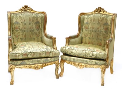 Lot 406 - A pair of Louis XV-style gilt wood bergère chairs