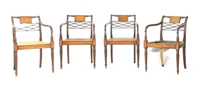 Lot 555 - A set of four Sheraton mahogany armchairs