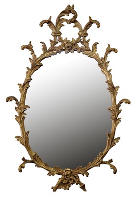 Lot 556 - A George III carved giltwood wall mirror