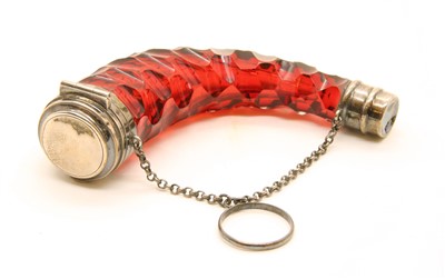 Lot 34 - A novelty 'horn' ruby glass scent bottle
