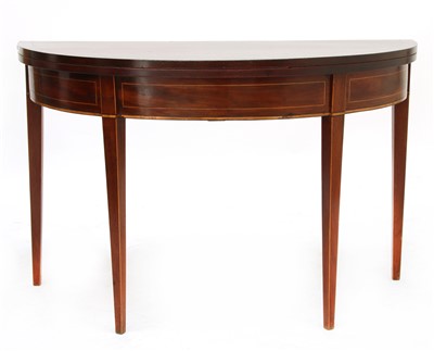 Lot 351 - A George III strung mahogany D-shaped tea table