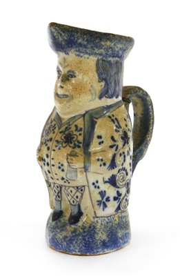 Lot 181 - An unusual Delft toby jug