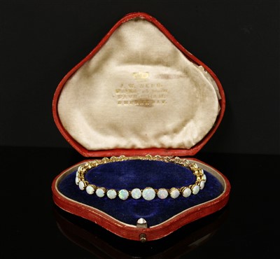 Lot 98 - An Edwardian gold opal bracelet