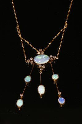 Lot 90 - An Edwardian opal and diamond négligée pendant