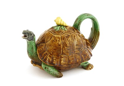 Lot 161 - A Minton Majolica tortoise teapot and cover