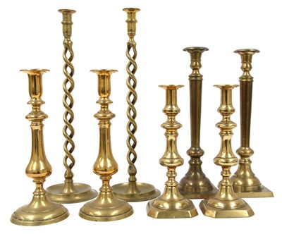 Lot 359 - A pair of brass open twist candlesticks