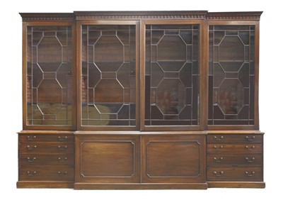 Lot 148 - A George III-style mahogany breakfront bookcase