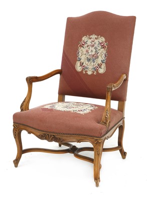 Lot 245 - A French walnut open armchair