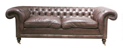 Lot 131 - A modern leather three-seater chesterfield settee
