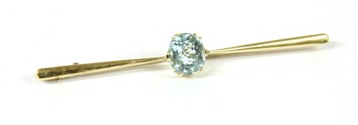 Lot 8A - A cased single stone oval mixed cut aquamarine bar brooch