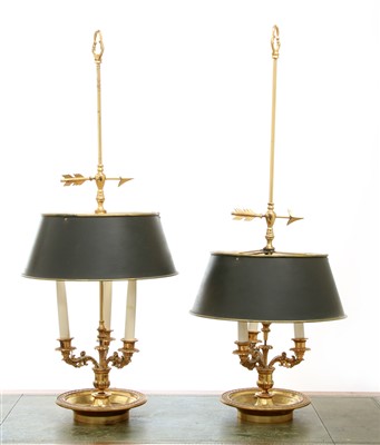 Lot 240 - A pair of brass three-light table lamps
