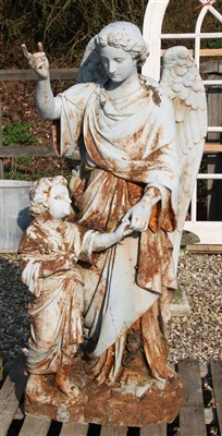 Lot 272 - A white painted figural group of an angel with a child