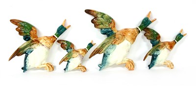 Lot 139 - A set of four graduated Beswick flying ducks