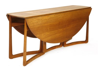 Lot 281 - A Danish teak drop-leaf dining table