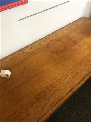 Lot 281 - A Danish teak drop-leaf dining table