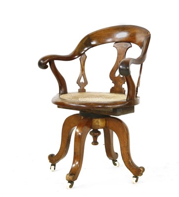 Lot 263 - A Victorian mahogany captain's desk chair