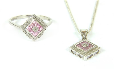Lot 12 - A diamond and possibly pink topaz ring