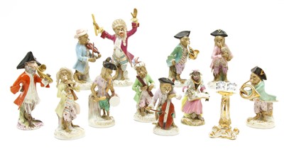 Lot 129 - Eleven Continental porcelain monkey band figures