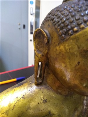 Lot 564 - A gilt bronze figure of Buddha