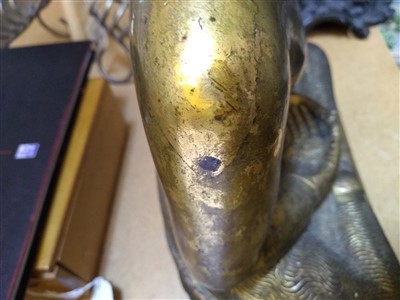 Lot 564 - A gilt bronze figure of Buddha