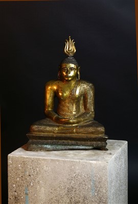 Lot 564 - A gilt bronze figure of Buddha
